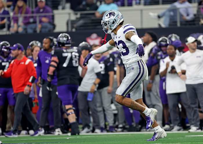 Dec 3, 2022; Arlington, TX, USA; Kansas State Wildcats cornerback Julius Brents (23) reacts after making an interception during the second half against the TCU Horned Frogs at AT&T Stadium. Mandatory Credit: Kevin Jairaj-USA TODAY Sports